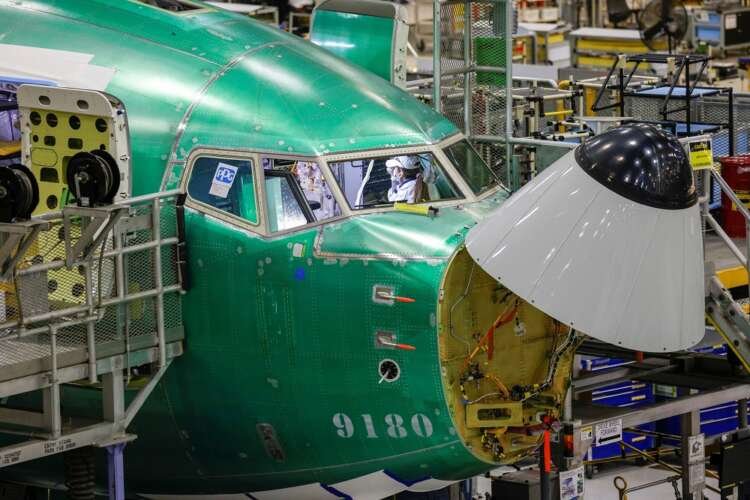 Boeing's P-8 production line showcasing aircraft manufacturing amid supply chain issues - Global Banking & Finance Review