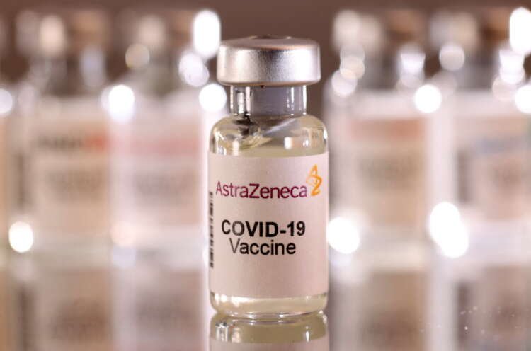 Illustration of AstraZeneca COVID-19 vaccine vial highlighting blood clot risks - Global Banking & Finance Review