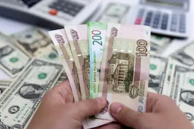 Image for Russian rouble falls below 62 vs dollar on Friday trade