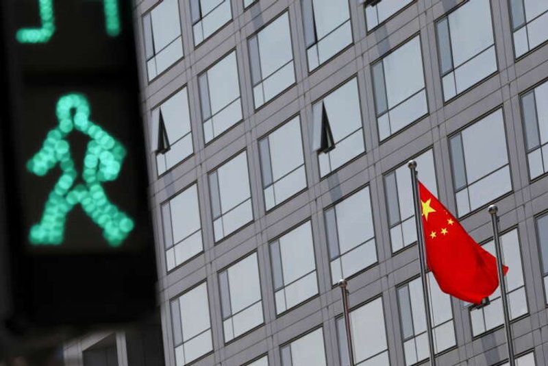 Image for China to push on with opening capital markets to foreign investors
