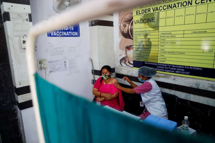 Image for Fears of vaccine exclusion as India uses digital ID, facial recognition