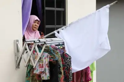 Image for As lockdown bites, Malaysians hoist white flags in plea for help