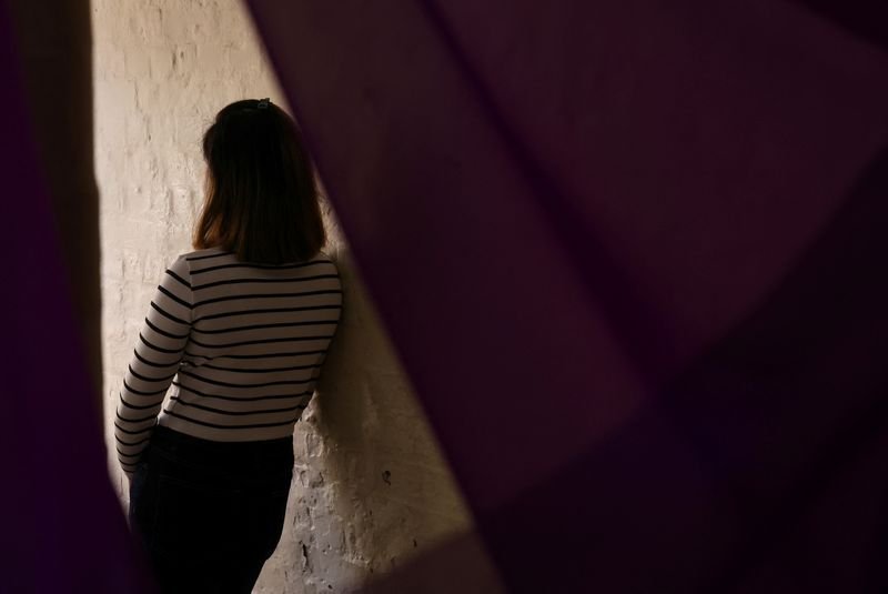 Illustration of modern slavery victims facing challenges under UK immigration policy - Global Banking & Finance Review