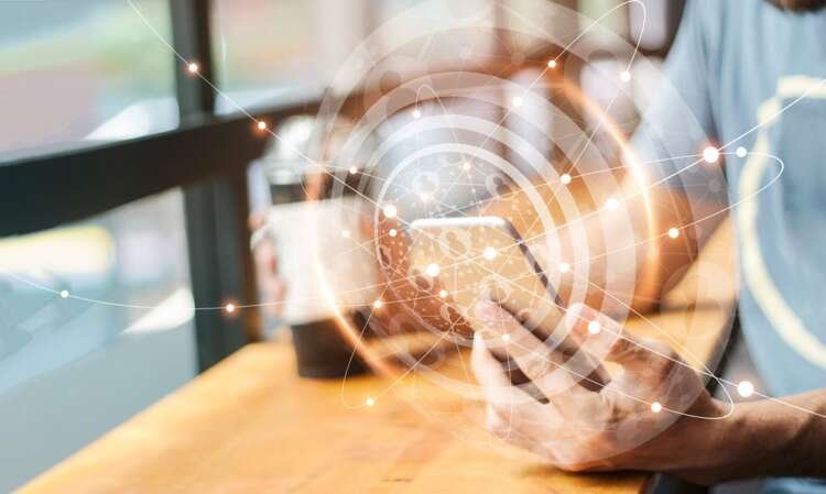 Person engaging with digital finance tools, highlighting banking innovation - Global Banking & Finance Review