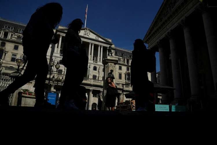 Pedestrians walk past the Bank of England amidst rising UK bond yields - Global Banking & Finance Review