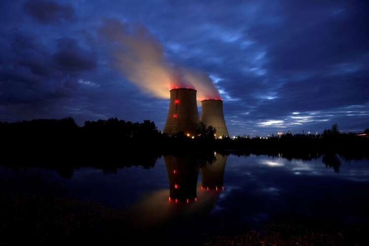 Steam rises from EDF nuclear power station, highlighting France's nationalisation plans - Global Banking & Finance Review