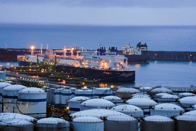 LNG carrier unloading gas in Bilbao, symbolizing global LNG trade amid Ukraine crisis - Global Banking & Finance Review