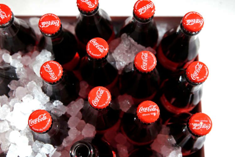 FILE PHOTO: Bottles of Coca-Cola are pictured during a presentation in Paris