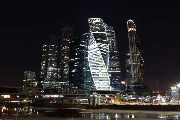 Moscow skyline illuminated during Earth Hour, reflecting on banking sector changes - Global Banking & Finance Review