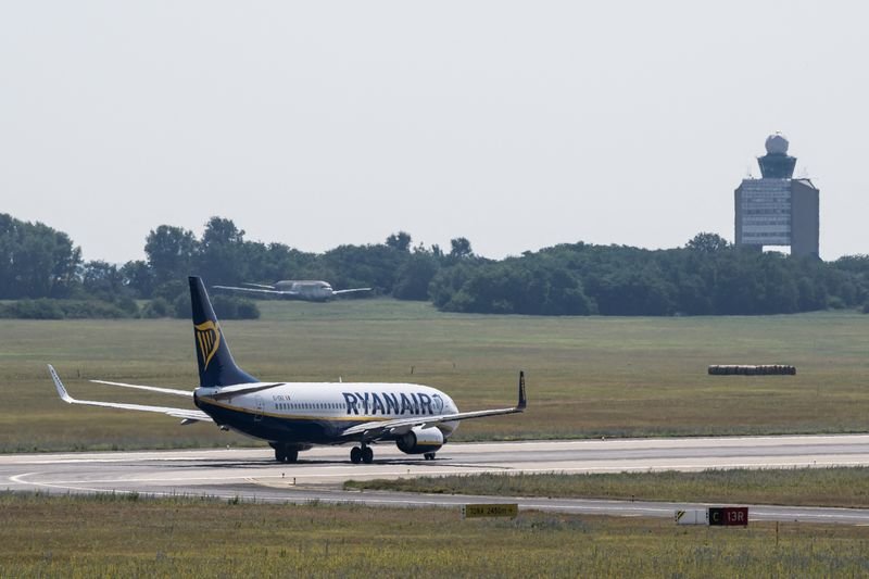 Ryanair airplane at an airport, linked to lawsuit for €15,000 due to passenger disruption - Global Banking & Finance Review