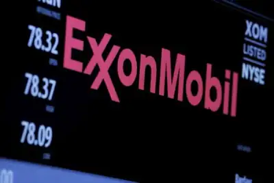 Image for Exxon earnings hurt by Russia exit, triples buybacks on high oil prices