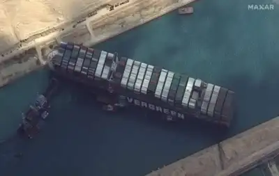 Image for Suez Canal steps up efforts to free stuck vessel, U.S. watches energy market impact
