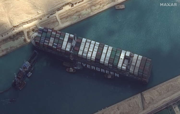Image for Suez Canal steps up efforts to free stuck vessel, U.S. watches energy market impact