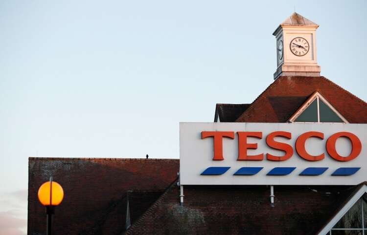 Tesco Extra store showcasing various products as Britons trade down amid inflation - Global Banking & Finance Review