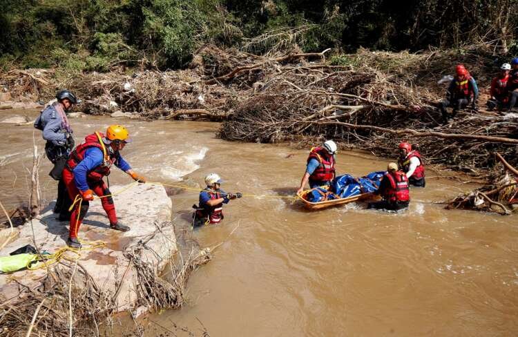 Search and rescue team airlifting a flood victim in Durban, highlighting climate risks in Africa - Global Banking & Finance Review