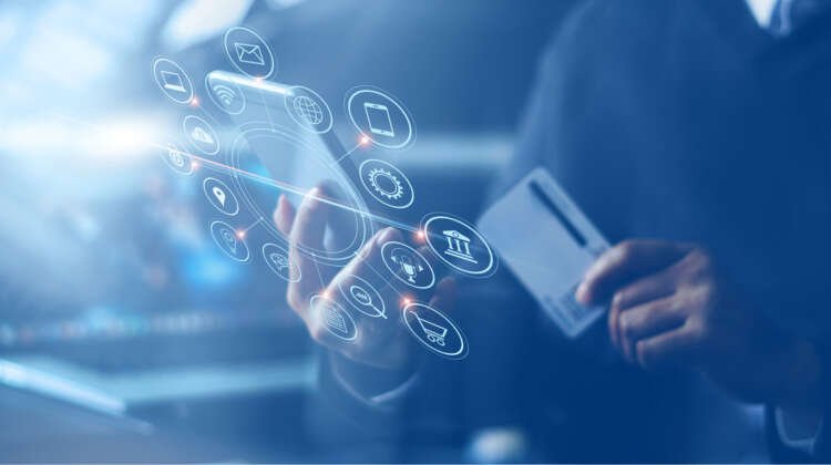 Businessman using smartphone for online banking, highlighting digital account opening - Global Banking & Finance Review