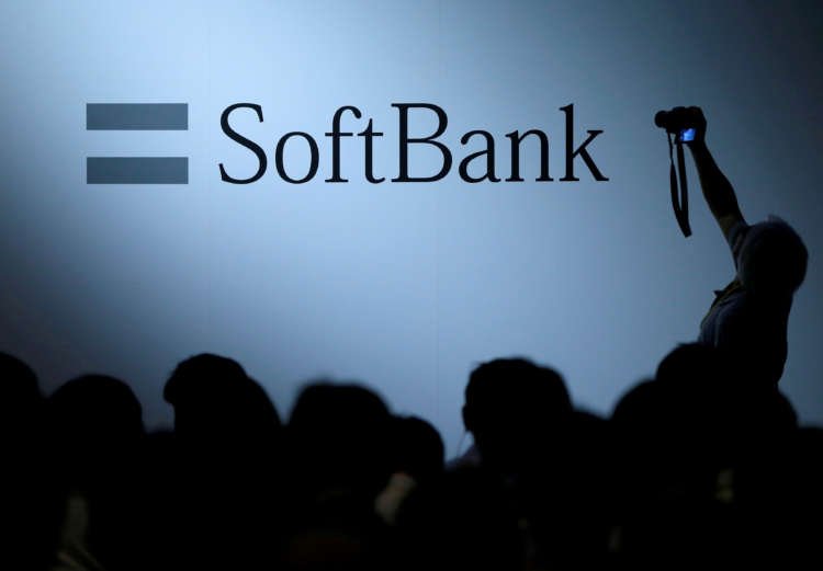 Softbank logo with financial growth graphics related to THG investment - Global Banking & Finance Review