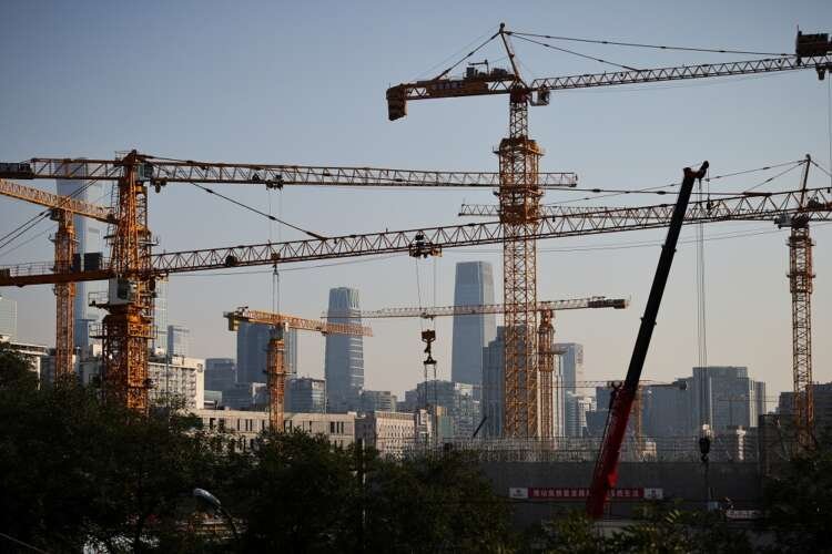 Beijing Central Business District skyline with cranes, reflecting China's economic recovery - Global Banking & Finance Review