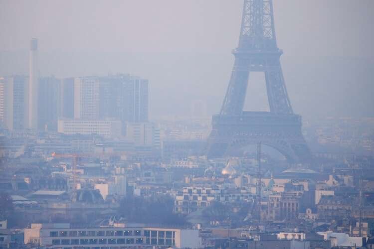 Eiffel Tower shrouded in haze, symbolizing Europe's economic challenges - Global Banking & Finance Review