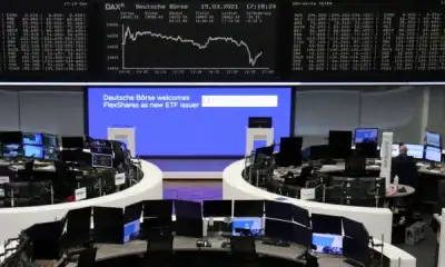 Image for Europe rises, auto rally lifts German DAX to record high