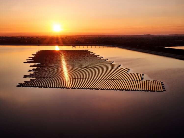 Floating solar installation at Queen Elizabeth II Reservoir, showcasing renewable energy potential - Global Banking & Finance Review
