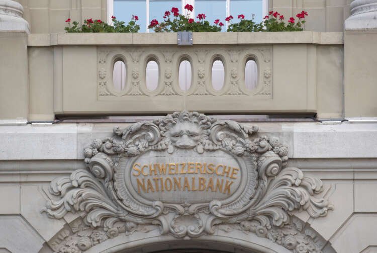 Swiss National Bank building in Bern reflecting current financial challenges - Global Banking & Finance Review