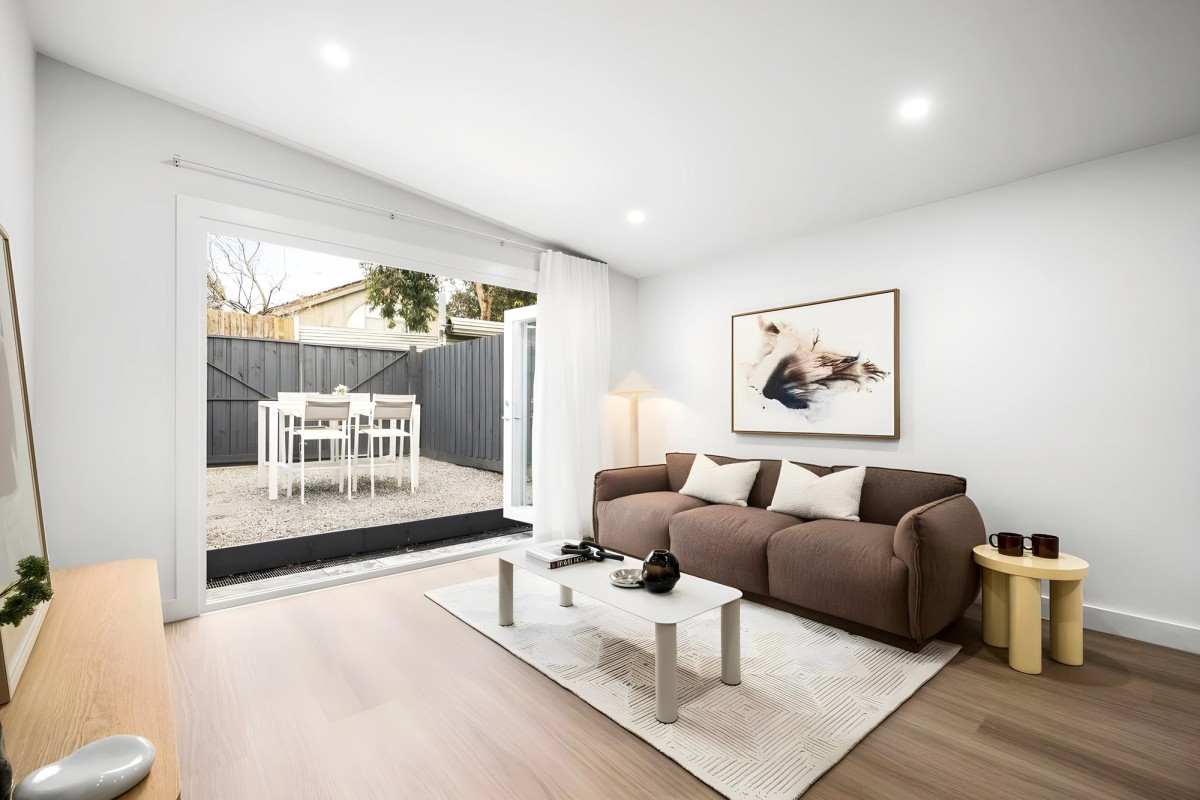Living room opening to the courtyard in the Ascot Vale home