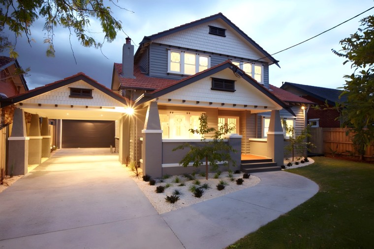 Front of the Carnegie custom home at dusk