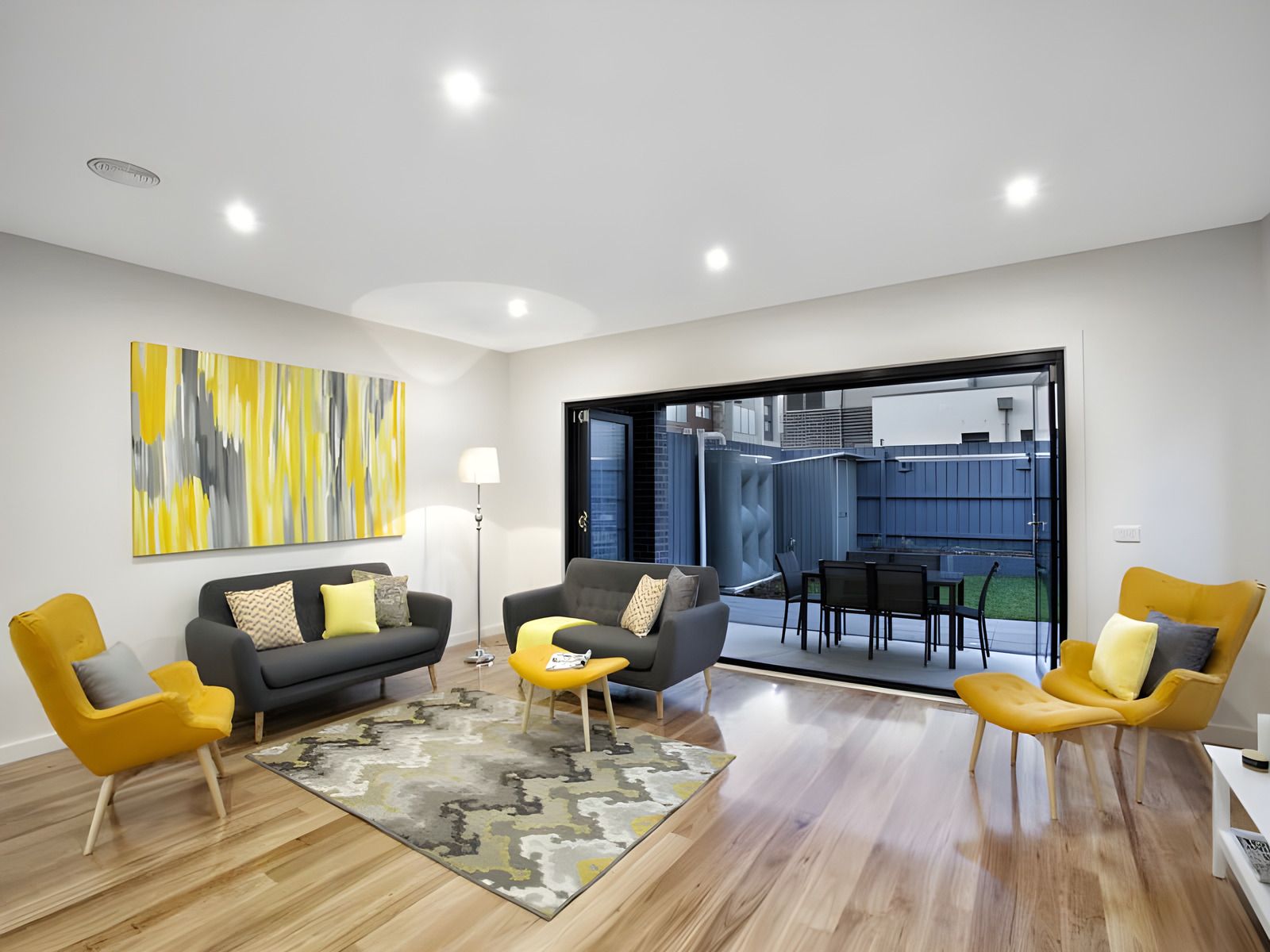 Living room opening to the outdoor area in the Glen Huntly townhouses