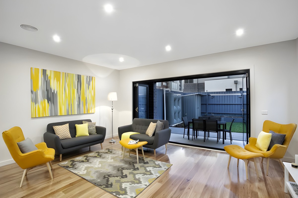Living room opening to the outdoor area in the Glen Huntly townhouses