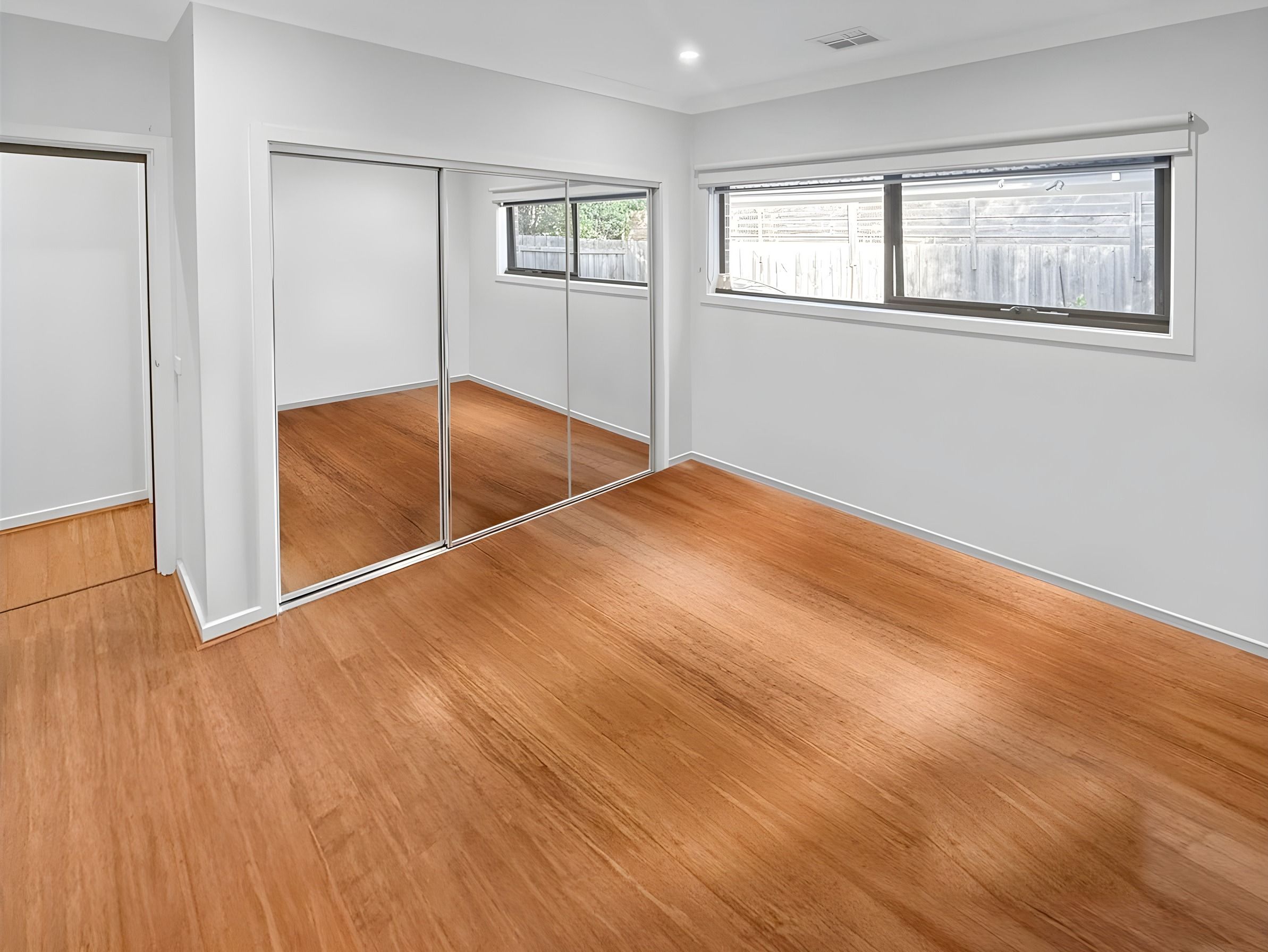 Bedroom with mirrored robes in the Glenroy dual occupancy