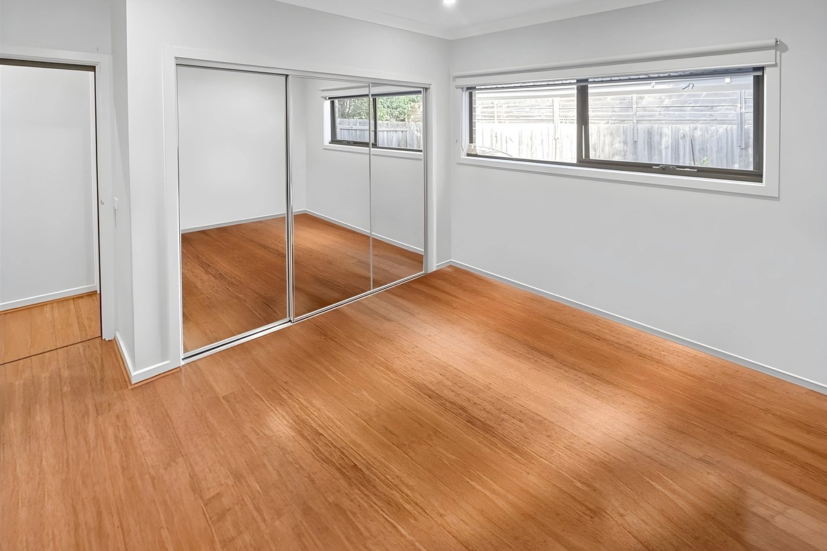 Bedroom with mirrored robes in the Glenroy dual occupancy