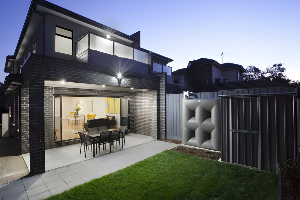 Rear of the Glen Huntly townhouses and the back garden at dusk