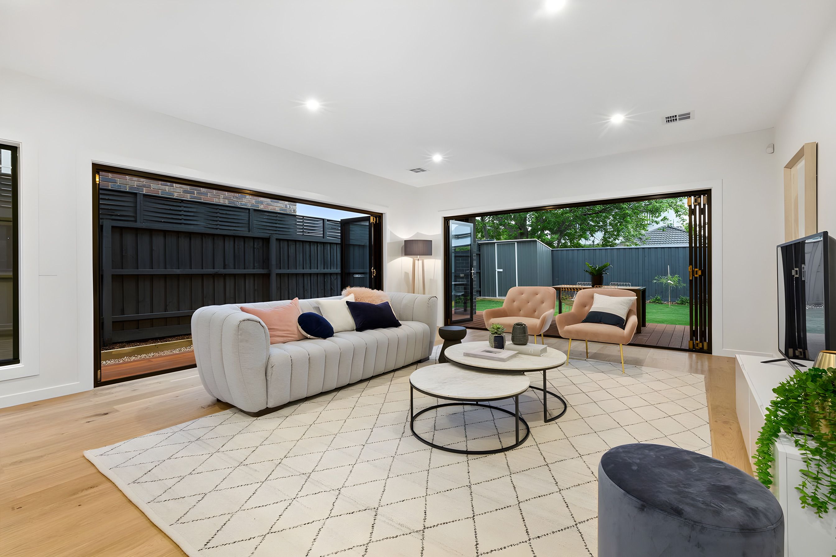 Living room opening to the deck in the Bentleigh East townhouses