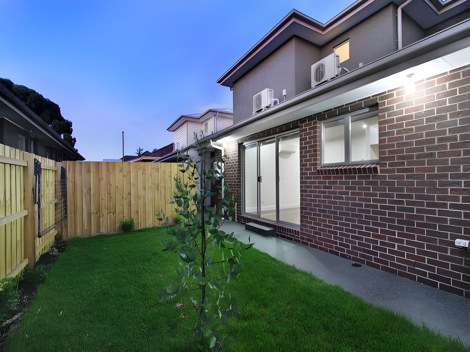 Rear of the Oakleigh townhouses at dusk