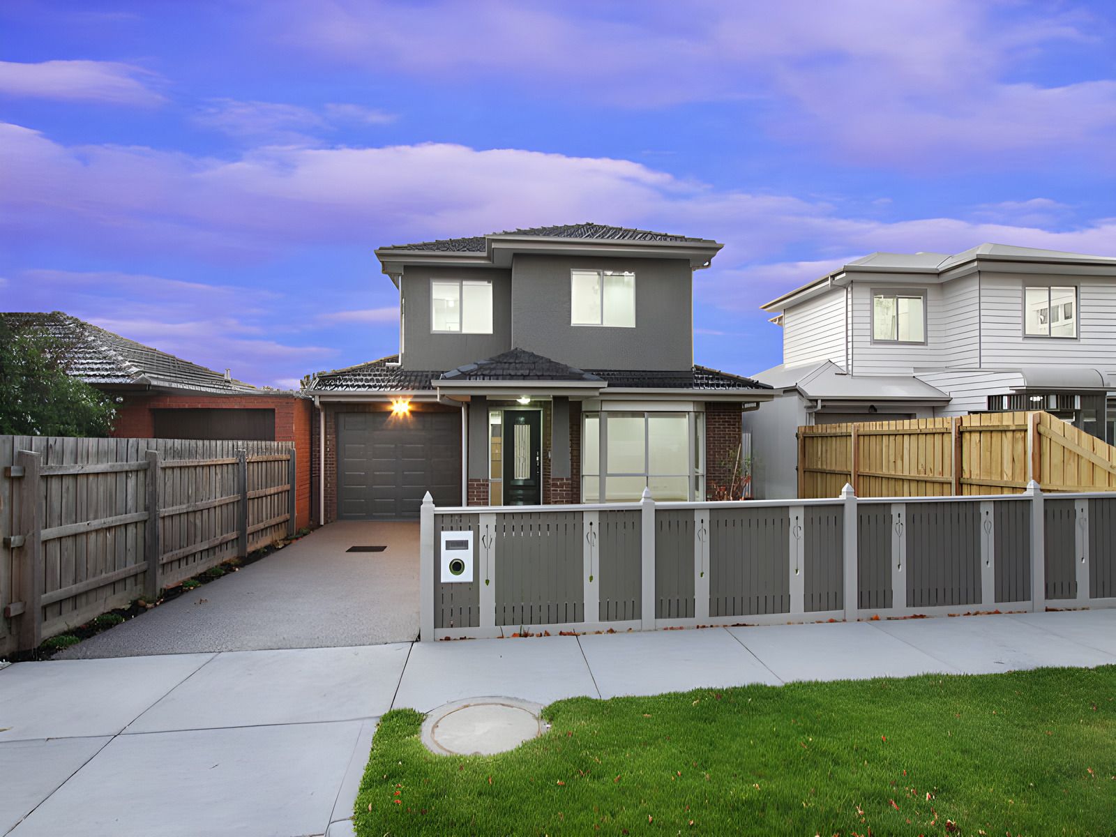 Front of the Oakleigh townhouses at dusk