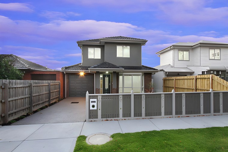 Front of the Oakleigh townhouses at dusk