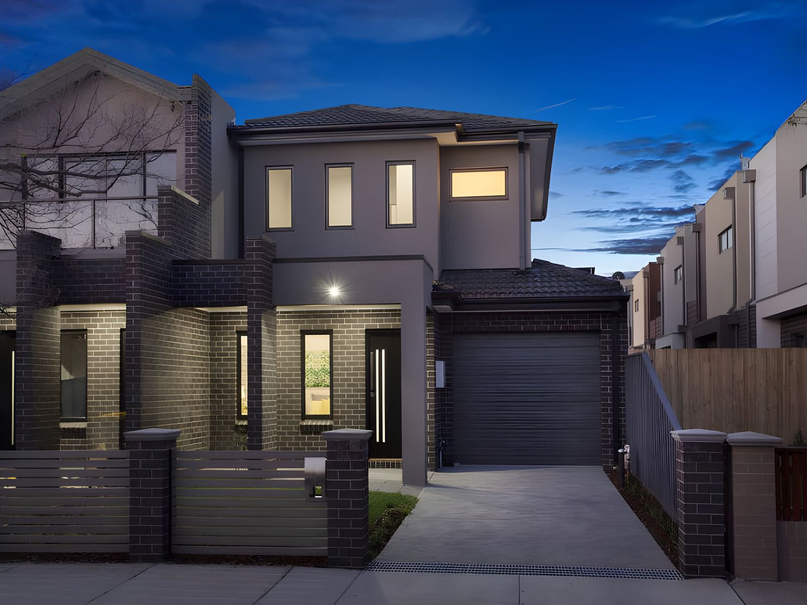 Front of the Glen Huntly side by side townhouses at dusk