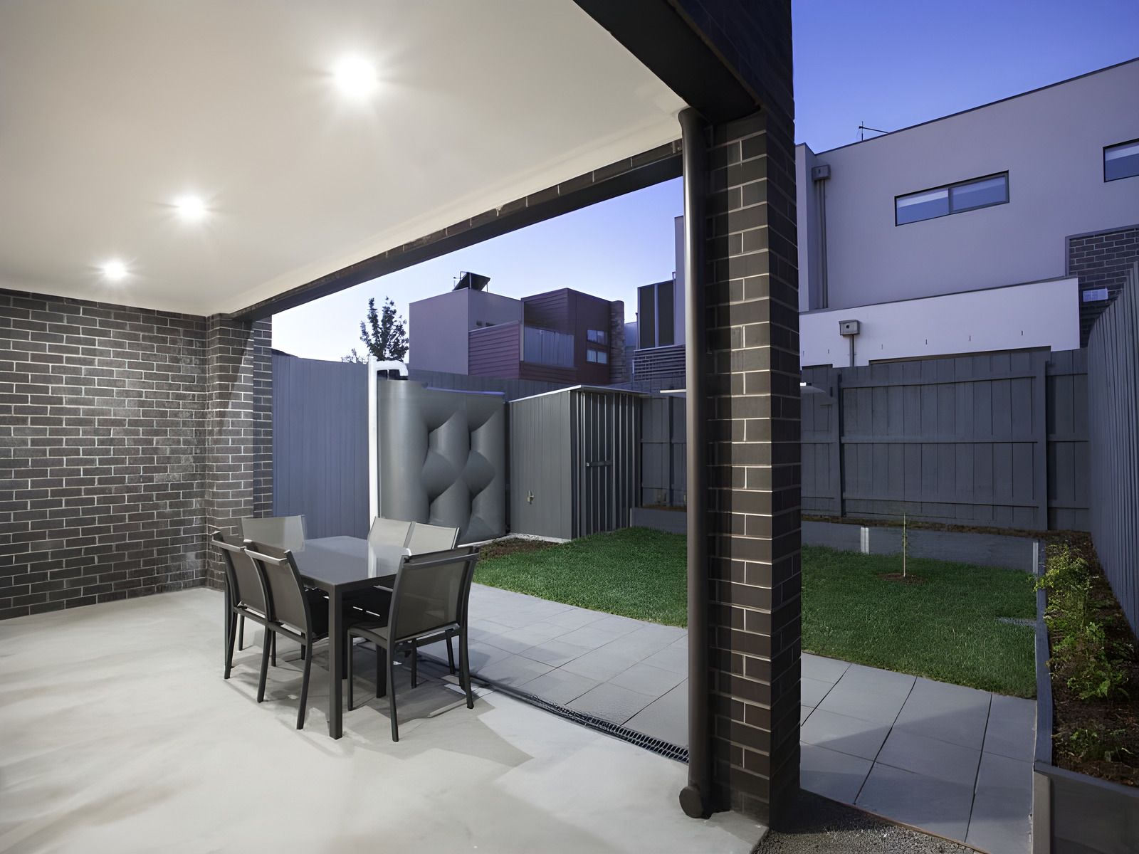 Covered outdoor area and back garden of the Glen Huntly townhouses