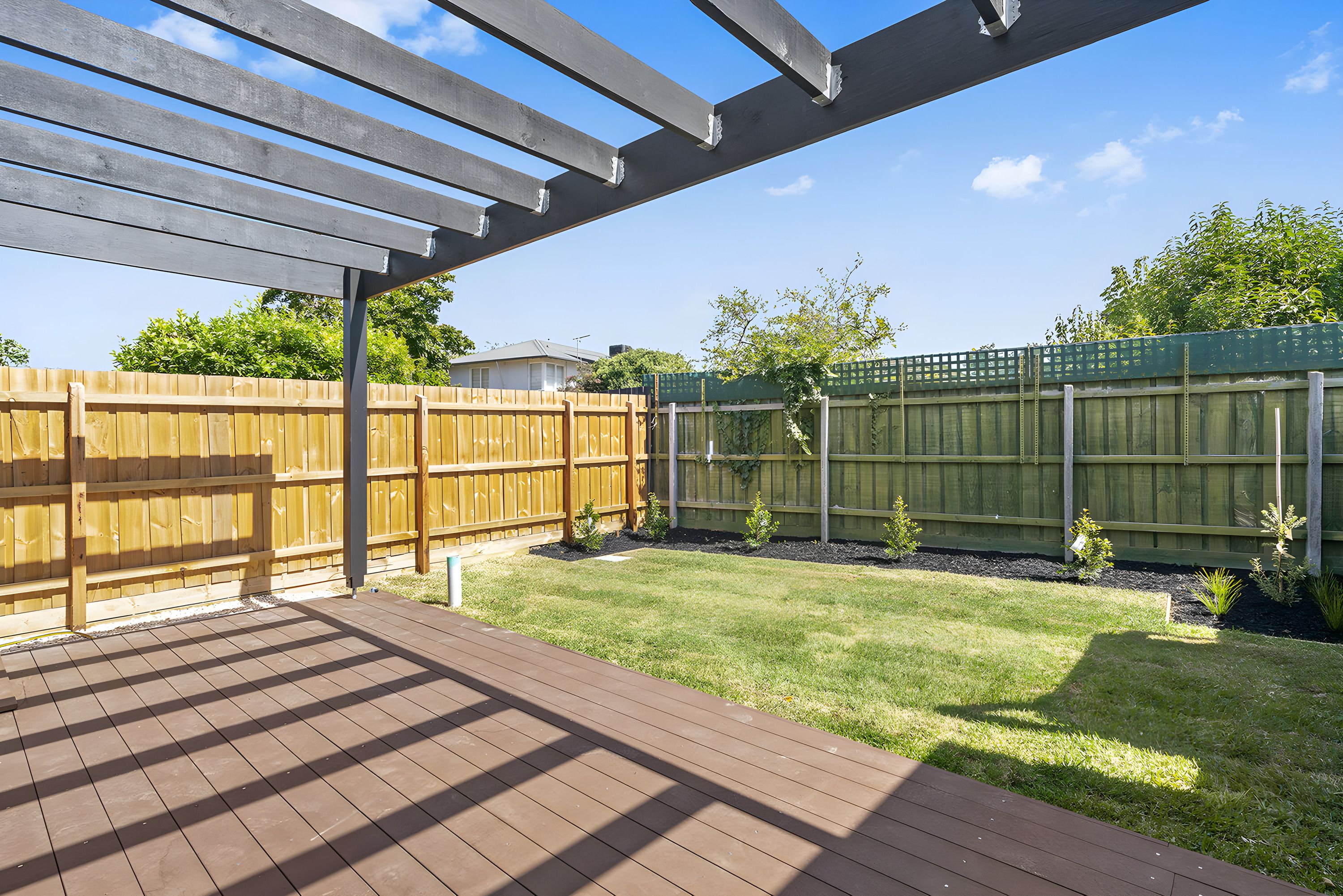 Deck and back garden of the Moorabbin townhouses