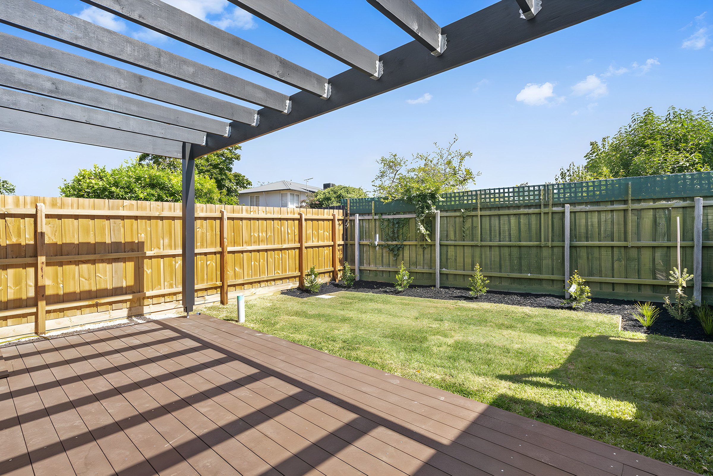 Pergola and back garden of the Moorabbin side by side townhouses