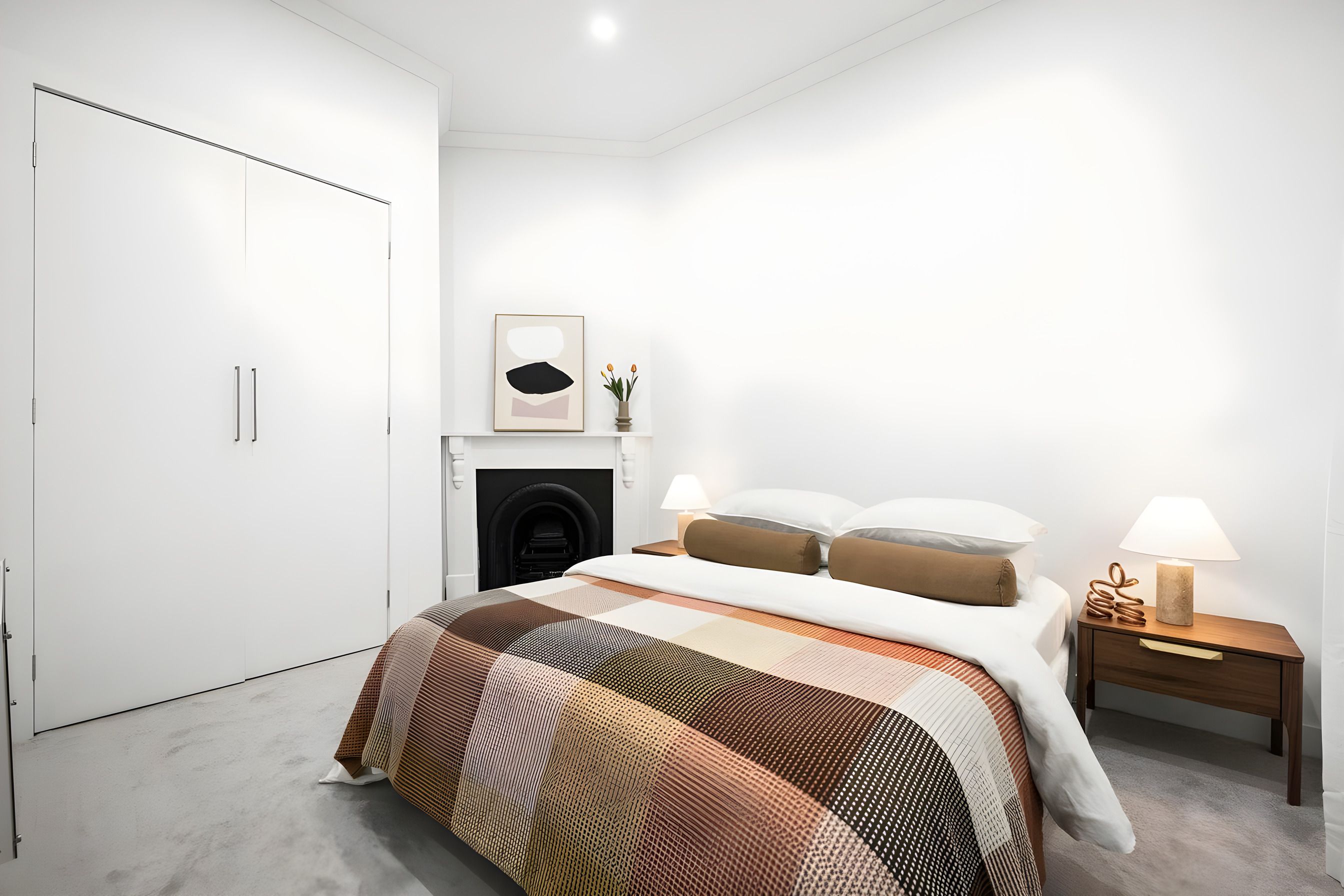 Bedroom with a fireplace in the Ascot Vale home
