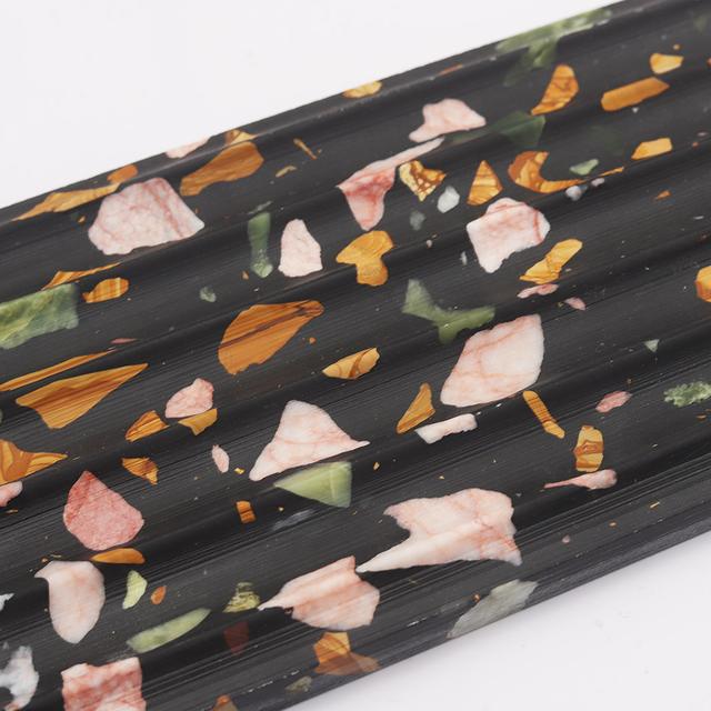 3D Black Terrazzo Fluted Tile with Colorful Stone Fragments — mosaic rãnh sọc (fluted) bằng đá terrazzo đen