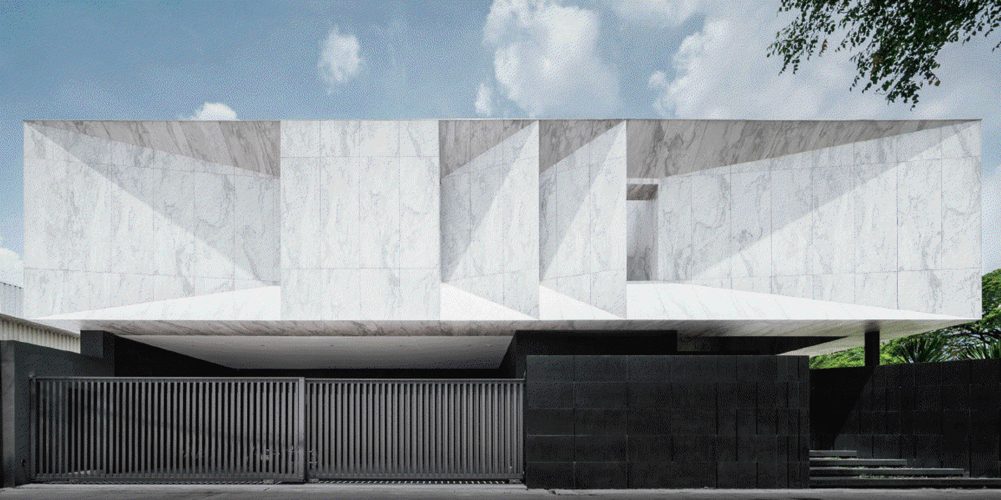 Mặt tường lớn ốp đá marble trắng vân nhẹ phong cách hiện đại