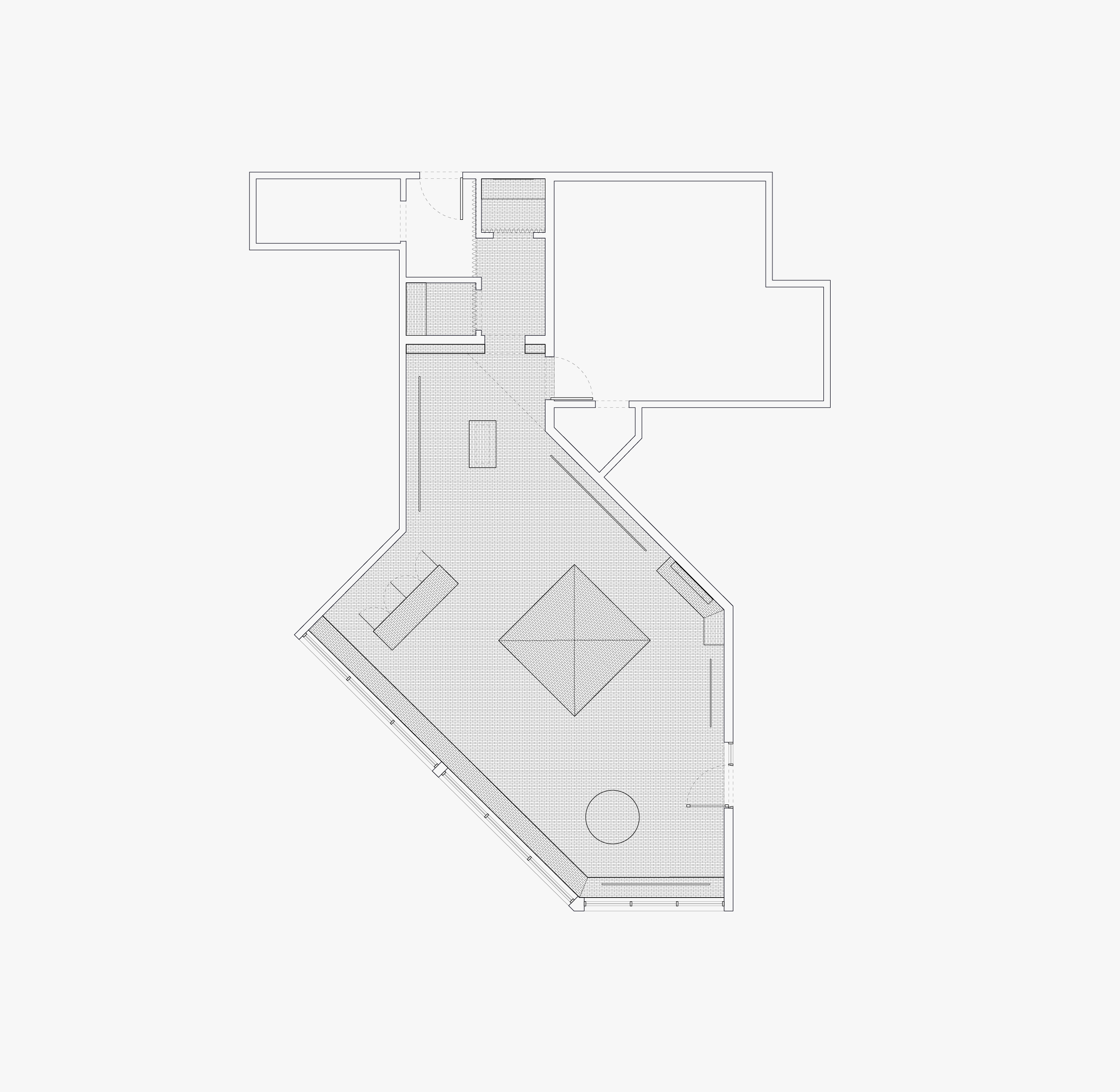 Architectural floor plan of an angular room featuring a large central square element and connecting spaces.