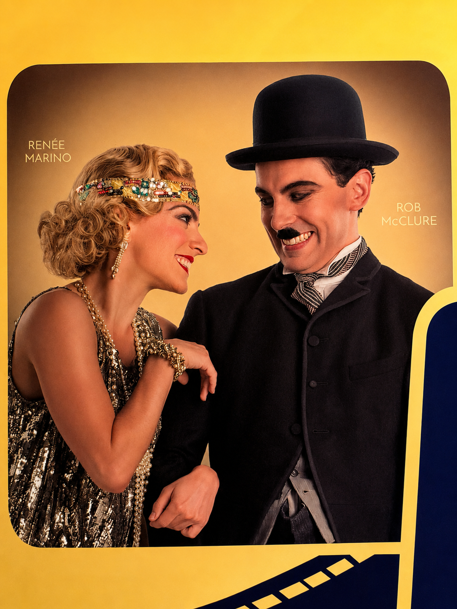 Renée Marino with Rob McClure on the Chaplin marquee at the Barrymore Theatre