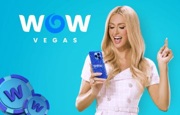 A picture showing the WOW Vegas brand ambassador, Paris Hilton playing on a mobile phone