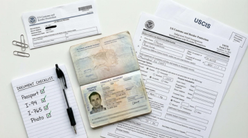 H-4 EAD Document Checklist with Passport I-94 and Form I-765 | Immiva Flat lay of required H-4 EAD filing documents including a foreign passport, I-94 arrival record, USCIS envelope, Form I-765 and a document checklist
