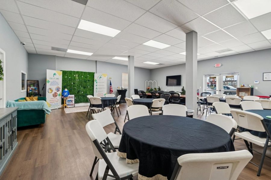Interior commercial event community room round tables — Commercial building renovation, Palmetto
