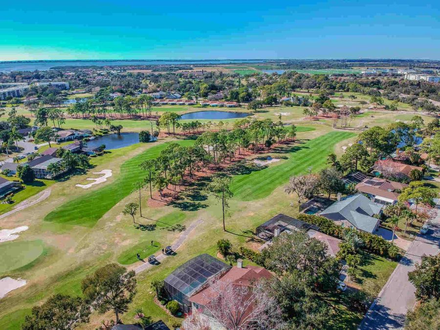 Aerial view of golf course fairway and bay — Custom home addition, pool, and renovation, Bradenton